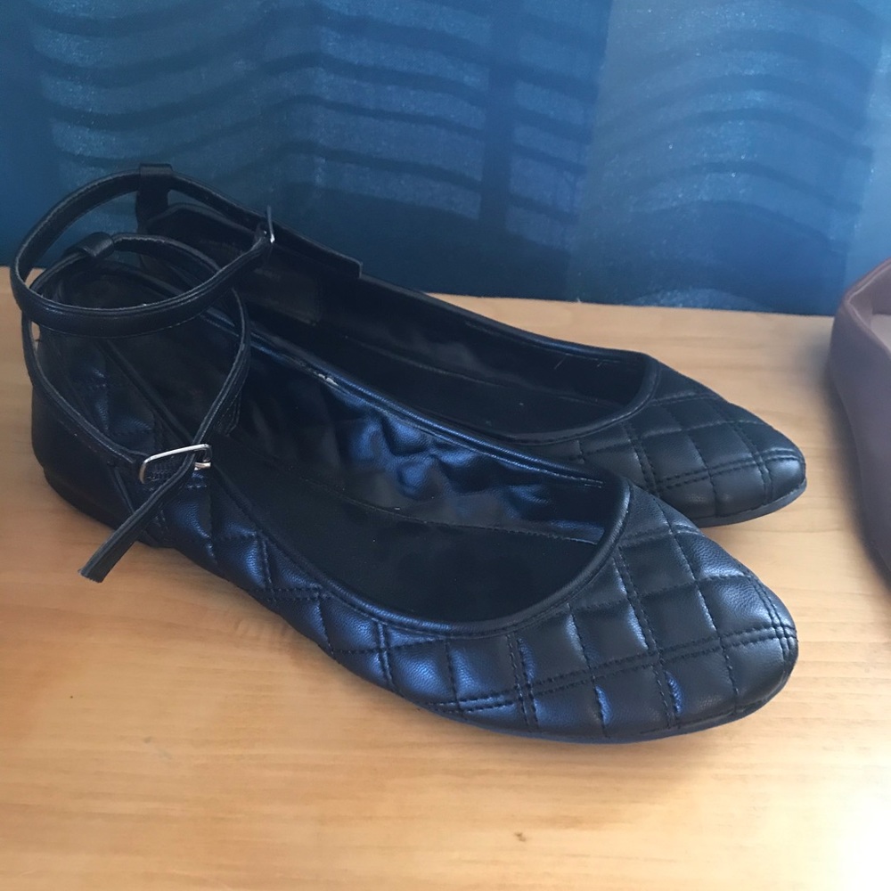 Black leather flats